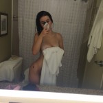 Nude brunette after shower