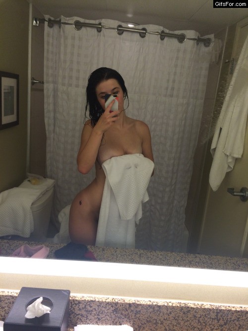 Nude brunette after shower